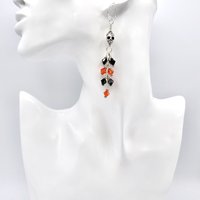just over 3 inches in length from the top of the ear wires