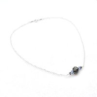 tiny light sapphire blue crystal beads with tiny Bali beads on each side