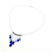 materials include sterling silver wire, chain, round spring ring clasp, tiny round beads and lead free silver plated pewter beads